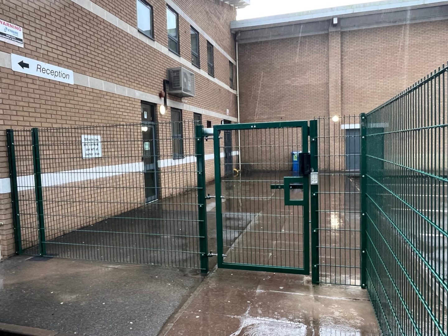 A pedestrian gate and mesh fending at Meadow Lane School