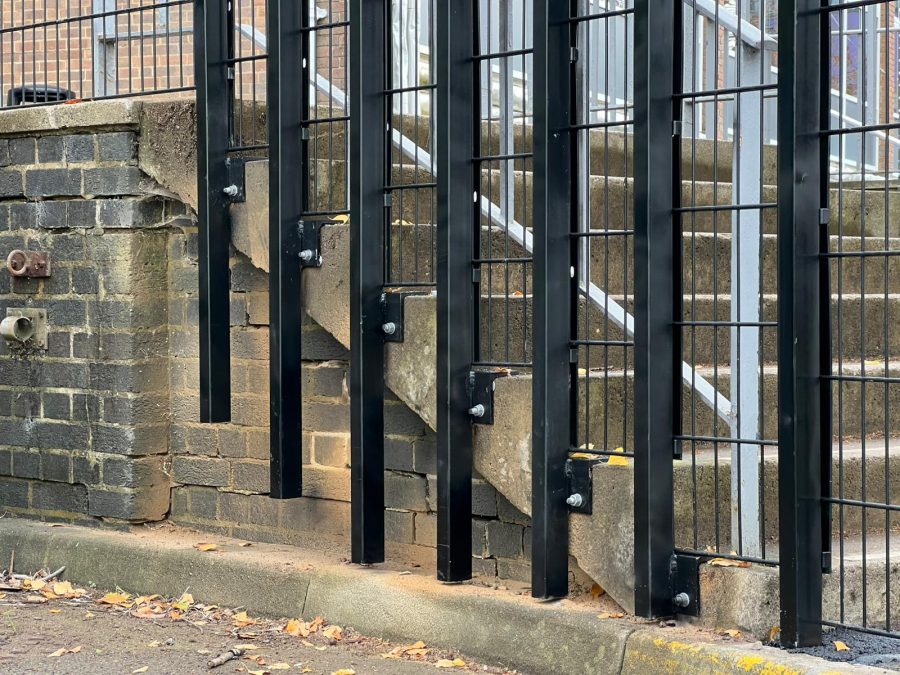 Black security mesh at the side of steps at Bilton School