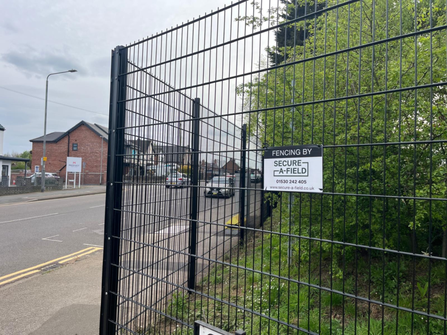 Black mesh fence at a primary school