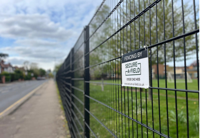 black steel mesh fencing on a primary school boundary