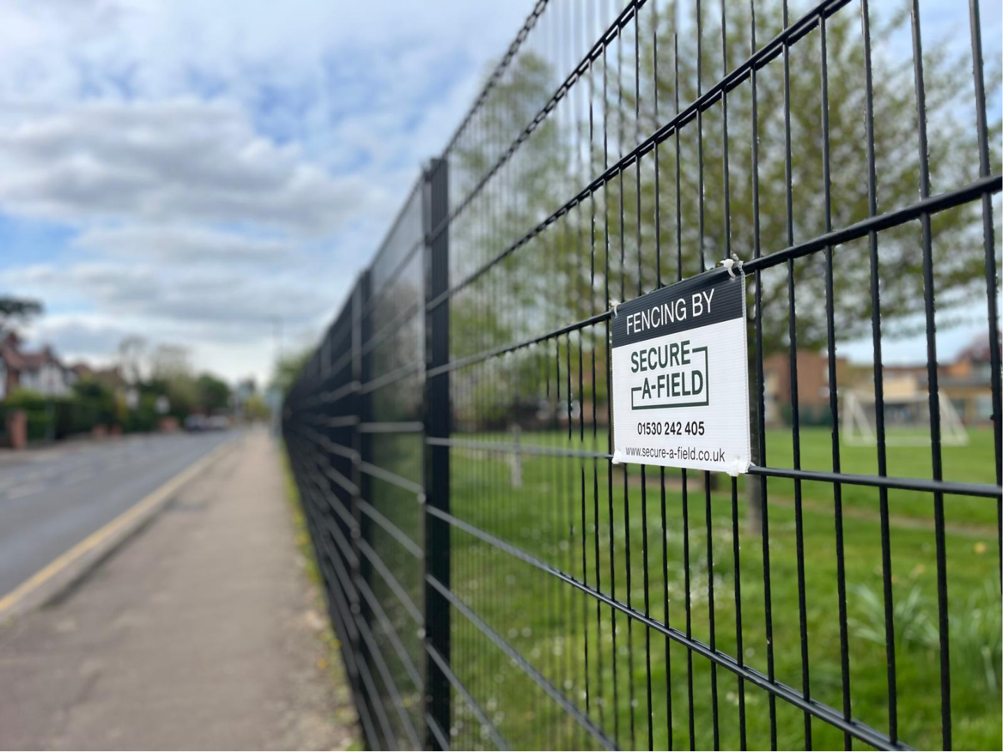 black steel mesh fencing on a primary school boundary