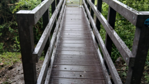 A long-life recycled plastic deck on a Bison pedestrian bridge