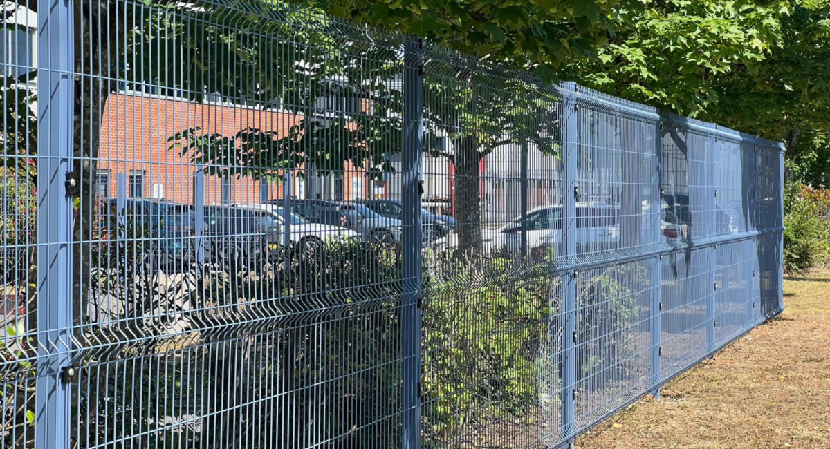 V Mesh fencing in a mid blue finish