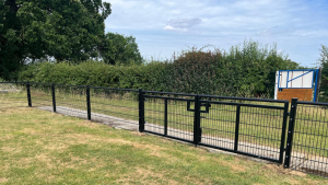 Black Spectator double gates at a football club - suitable for vehicle access