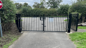 Black steel vehicle entrance gates