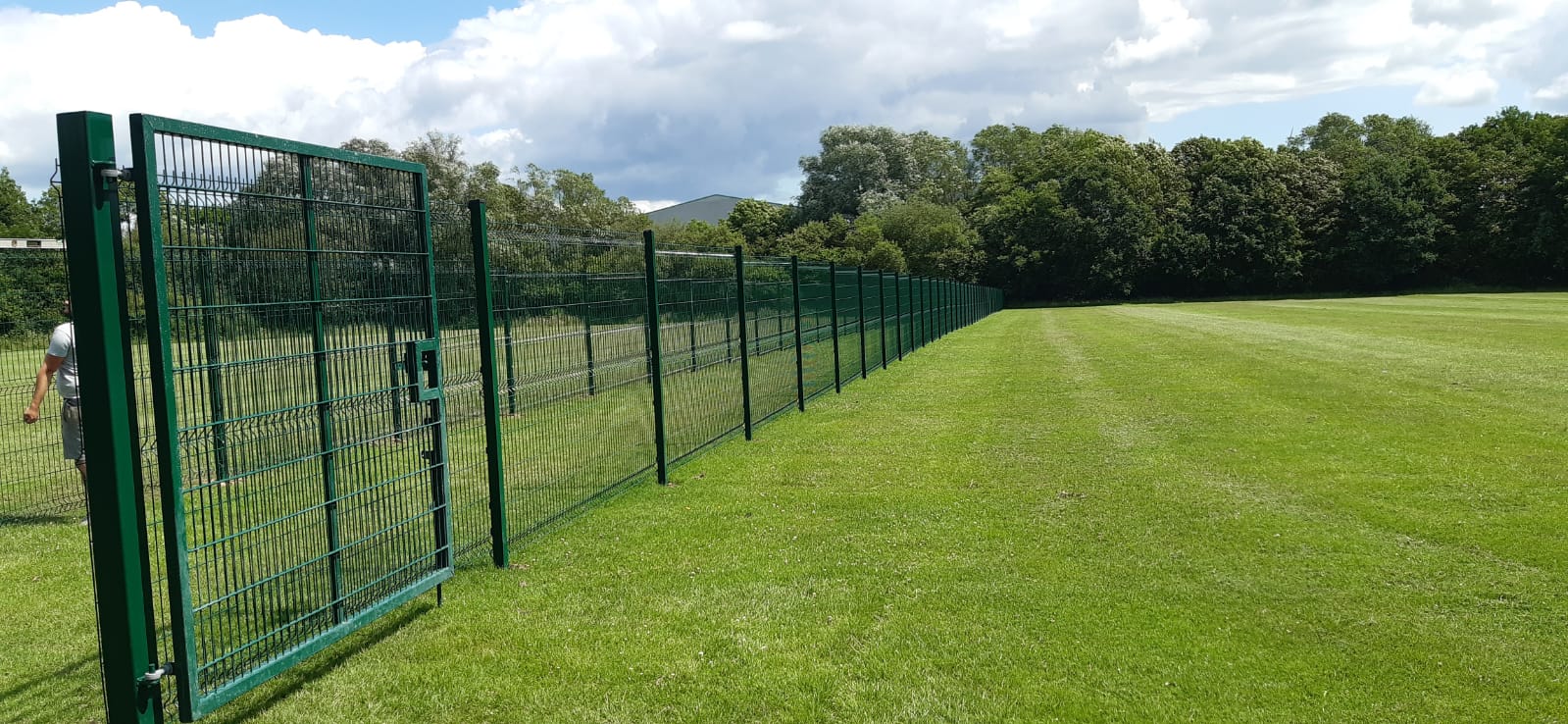Green Mesh fencing across sports field, Ashby School, Leicestershire